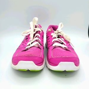 Pink Nike Flex running shoes